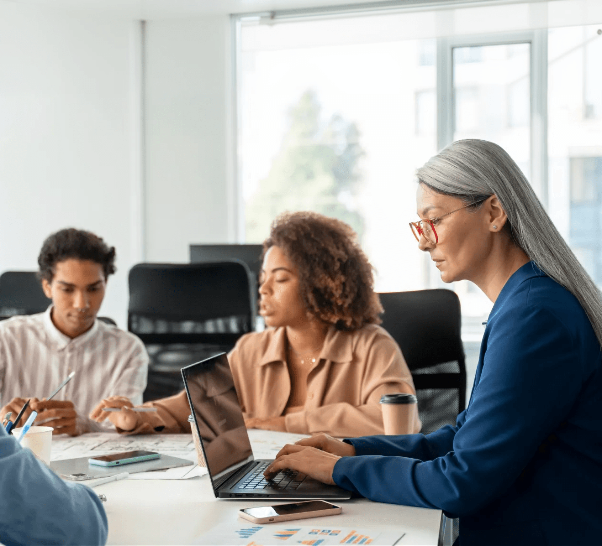 Procurement team comparing vendor quotes