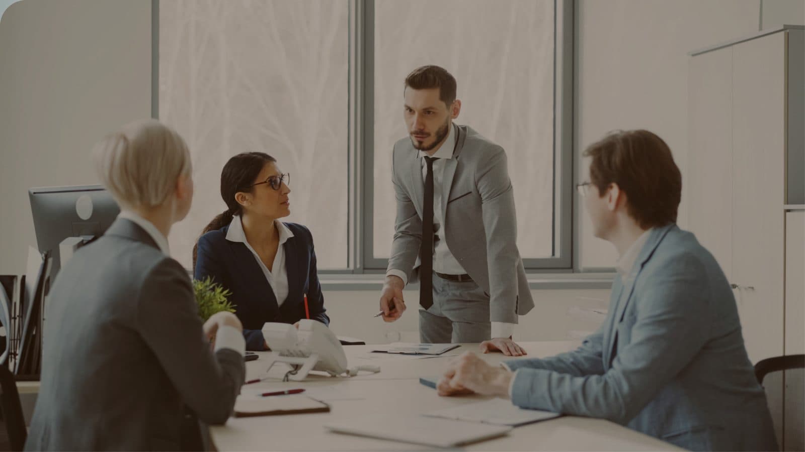 Estimating team reviewing an industrial electrical estimating bid and electrical material takeoff in industrial electrical estimating software